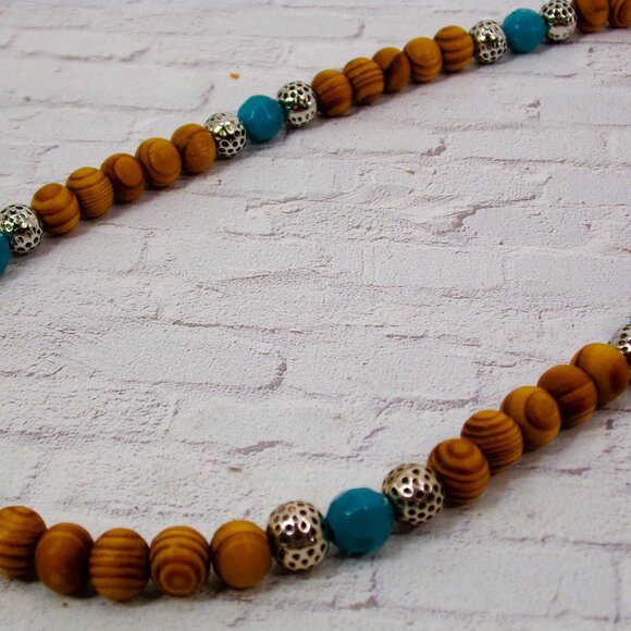 Wood bead necklace created with turquoise color beads and textured silver beads. - Picture 10 of 11